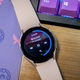 A photo of a wear os smartwatch playing YouTube Music